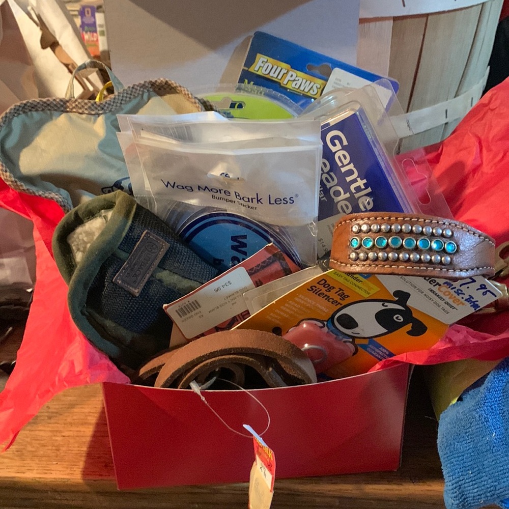 New! Box of dog grooming, a 3 latch leash, stickers, 2 raincoats, 1 mini coat